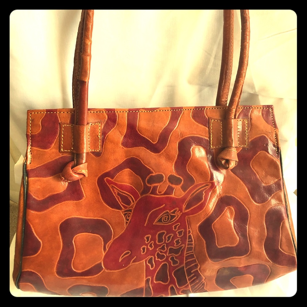 Leather purse with giraffe face